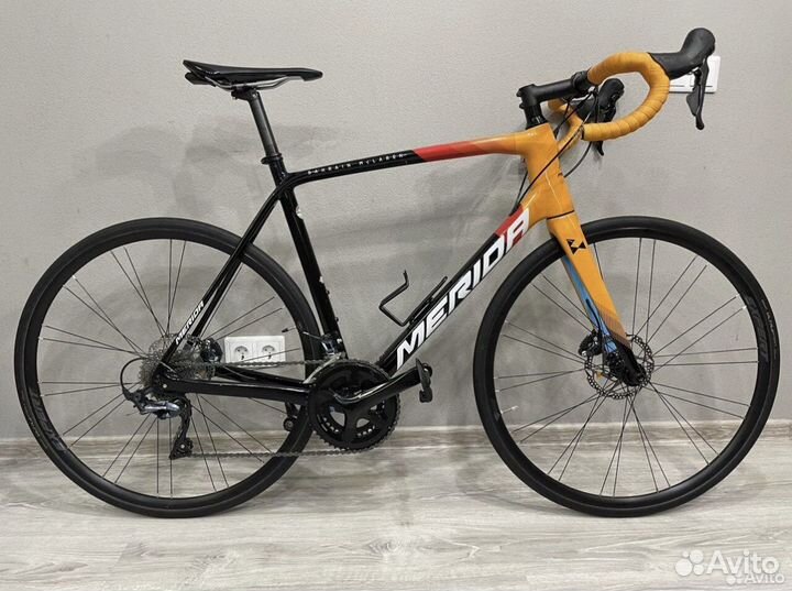 Шоссейный велосипед merida scultura disk 5000