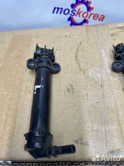 Форсунка омывателя фар левая Opel Antara Z22D1