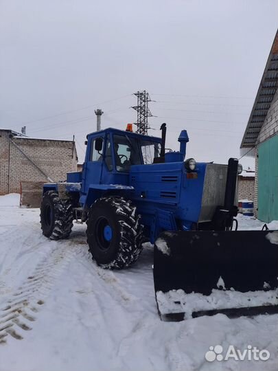 Чистка снега трактором