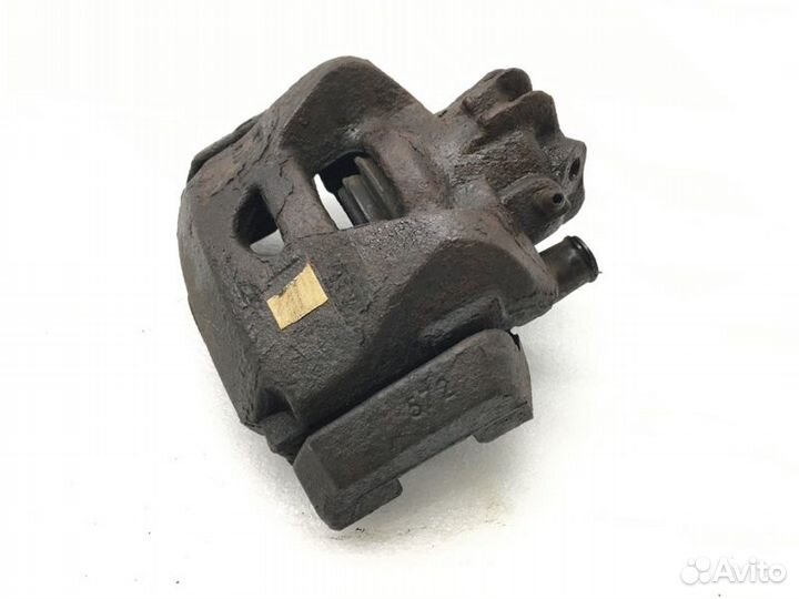 Суппорт тормозной передний левый Peugeot Partner