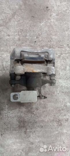 Суппорт задний правый kia k5