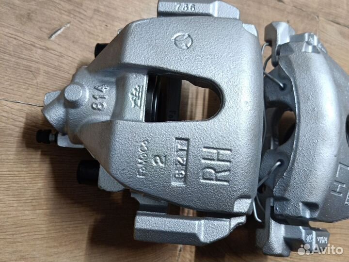 Передний суппорта форд фокус Мазда