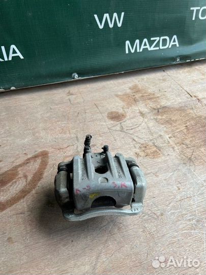 Суппорт тормозной задний правый Kia Quoris 1 G8BE