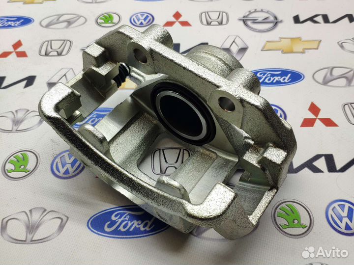 Суппорт тормозной LH Daewoo Nexia dohc