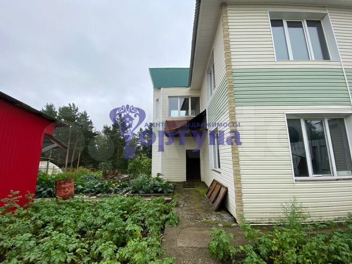 Коттедж 313 м² на участке 11 сот.