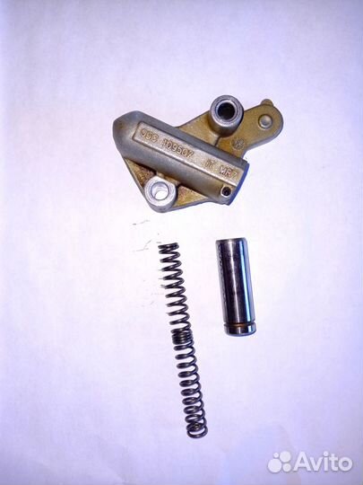 Натяжитель цепи грм