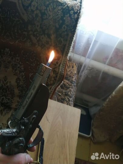 Зажигалка в виде пистолета