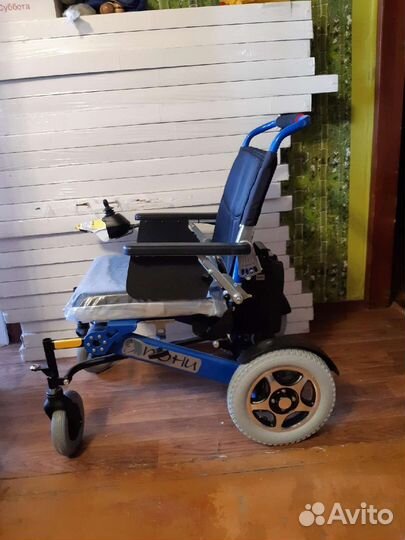 Инвалидная коляска с электроприводом