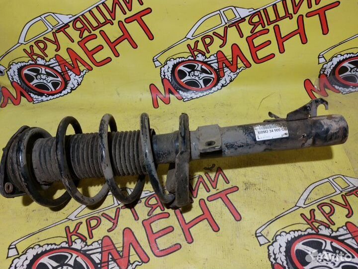 Стойка подвески передняя левая Mazda 3 Bl седан