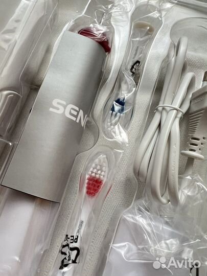 Электрическая зубная щетка новая