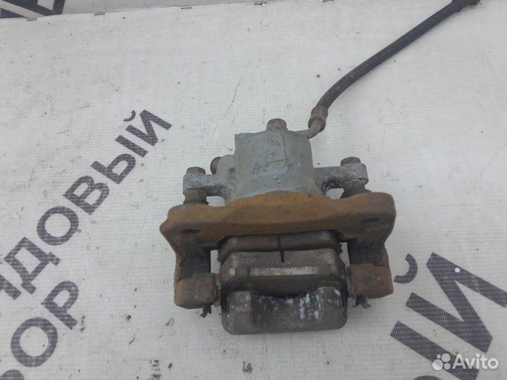 Тормозной суппорт задний правый Toyota Rav4 40