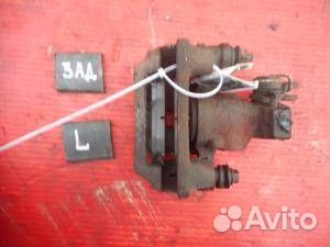 Суппорт задний левый Kia Clarus 1996-2001