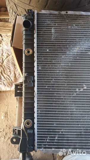 Радиатор охлаждения на сан енг актион спорт