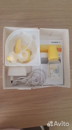 Молокоотсос medela электрический