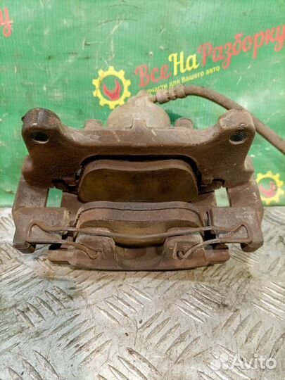 Суппорт передний правый Volkswagen Tiguan