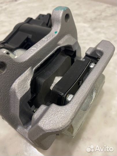 Суппорт тормозной задний левый Geely Monjaro 2021