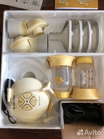 Молокоотсос электрический двойной Medela swing