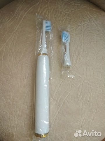 Электрическая зубная щетка новая