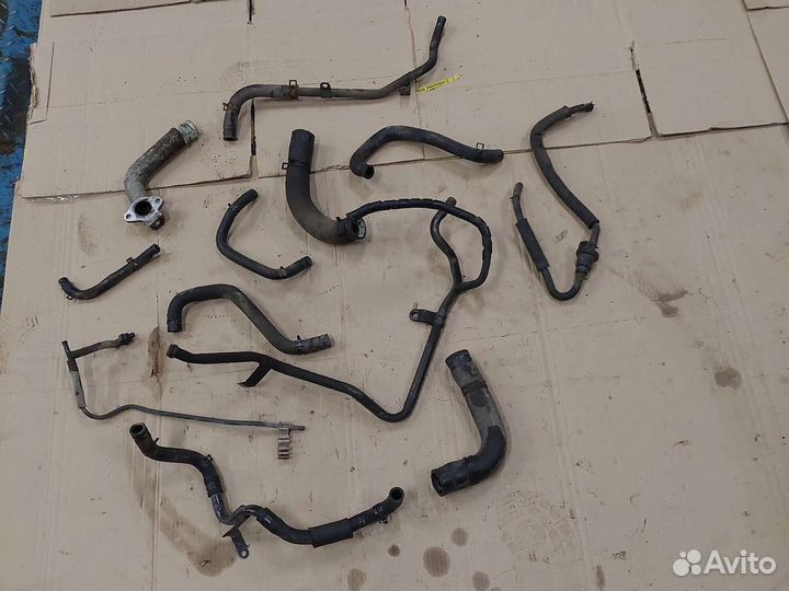 Патрубок системы охлаждения Kia Sportage 1 FE