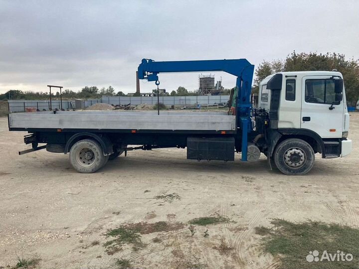 Водитель с личным грузовым манипулятором