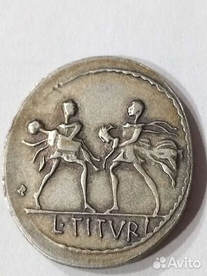 Монета, изображающая похищение сабинянок