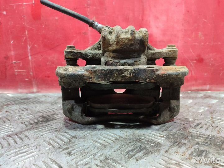 Суппорт тормозной передний левый Peugeot 308 / 4A