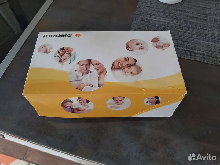 Молокоотсос medela