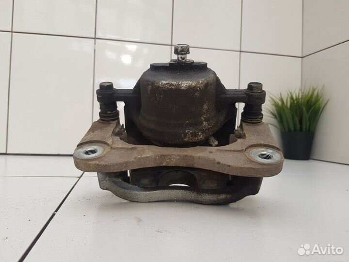 Суппорт передний левый (Geely Atlas)