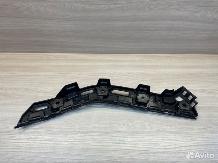 Кронштейн бампера задний левый Skoda Rapid