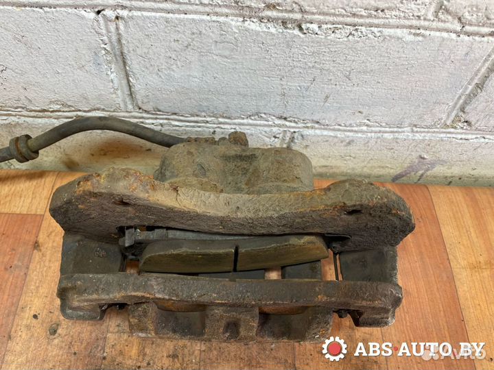 Суппорт тормозной передний левый Peugeot 4007 2009