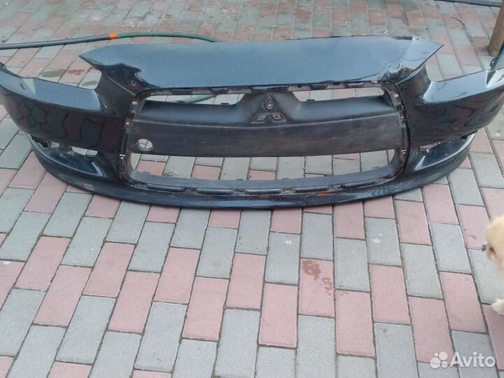 Вампер Мицубиси Лансер