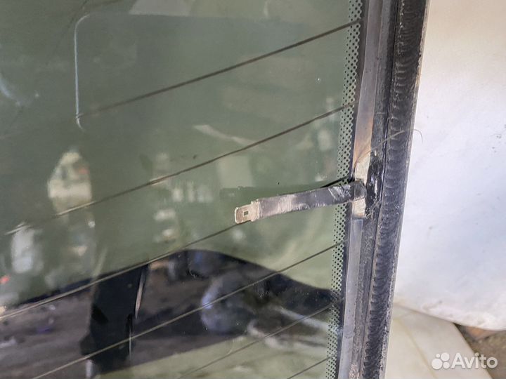 Стекло заднее Рено Меган 2