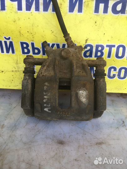 Суппорт тормозной передний правый Nissan Almera