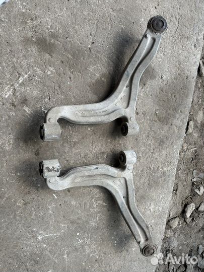 Cadillac srx задний рычаг