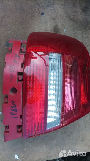 Audi a4 97- Фонарь задний левый новый