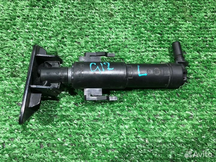 Форсунка омывателя фар девая на BMW G11/12