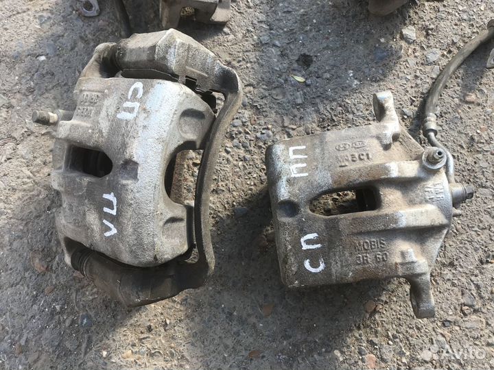 Суппорт передний задний киа спортейдж 3