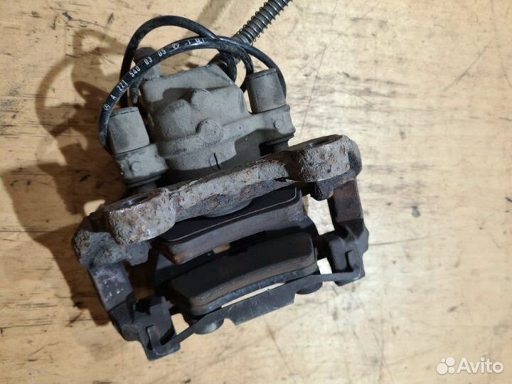 Суппорт тормозной задний левый Mercedes-Benz