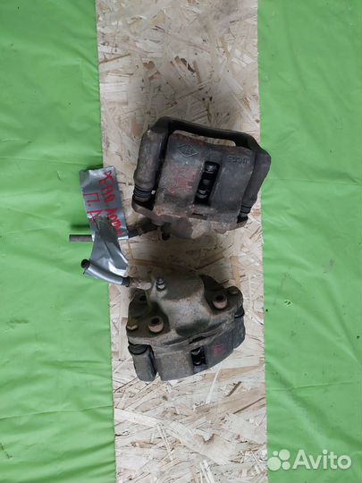 Суппорт тормозной Renault Logan