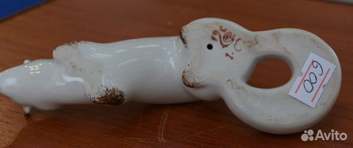 Фарфоровая статуэтка- норка