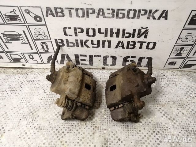 Суппорт тормозной передний для Nissan Almera N15