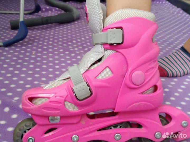 Роликовые коньки