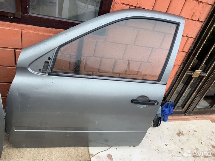 Двери на LADA калину 1