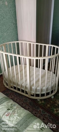 Детская кроватка с маятником круглая