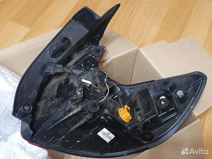 Фонарь задний левый