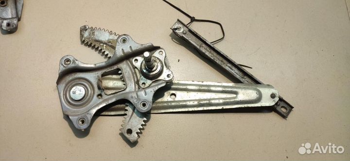 Стеклоподъемник задний левый Nissan AD Y12 2009