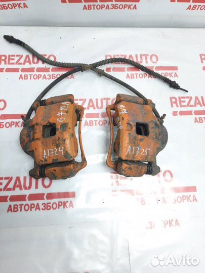 Суппорт тормозной передний левый Mitsubishi Galant