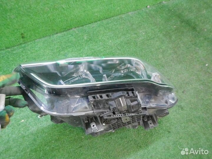 Фара левая BMW X1