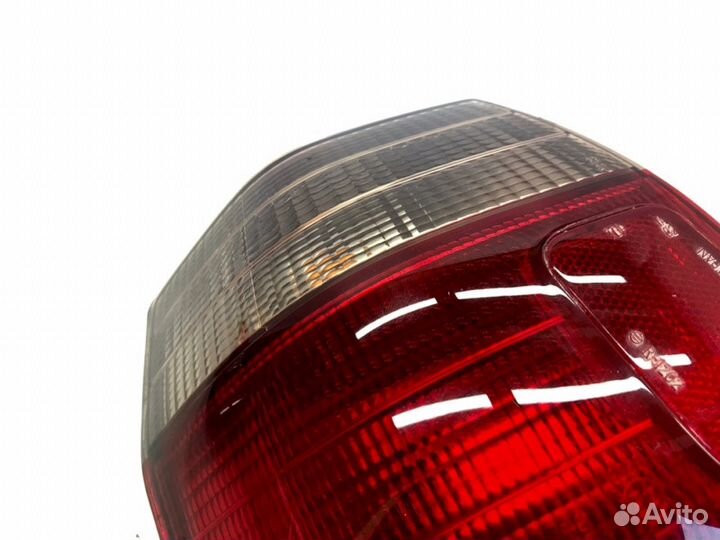 Фонарь задний задний левый Mitsubishi Legnum EC5W