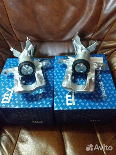 Суппорт задний Opel Astra J